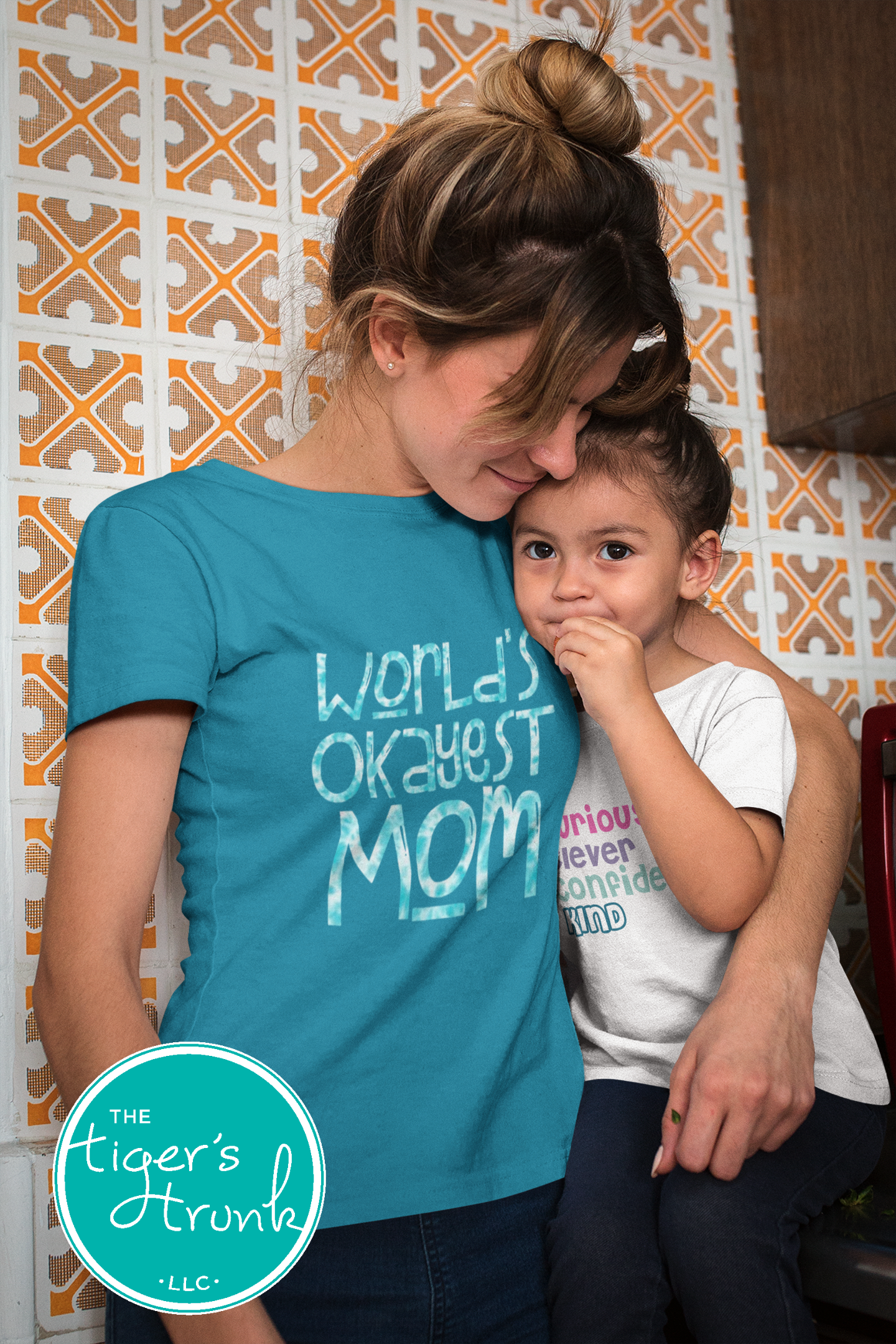 T-shirt with "World’s Okayest Mom" funny and casual design, perfect for Mother's Day, birthdays, or everyday mom life wear