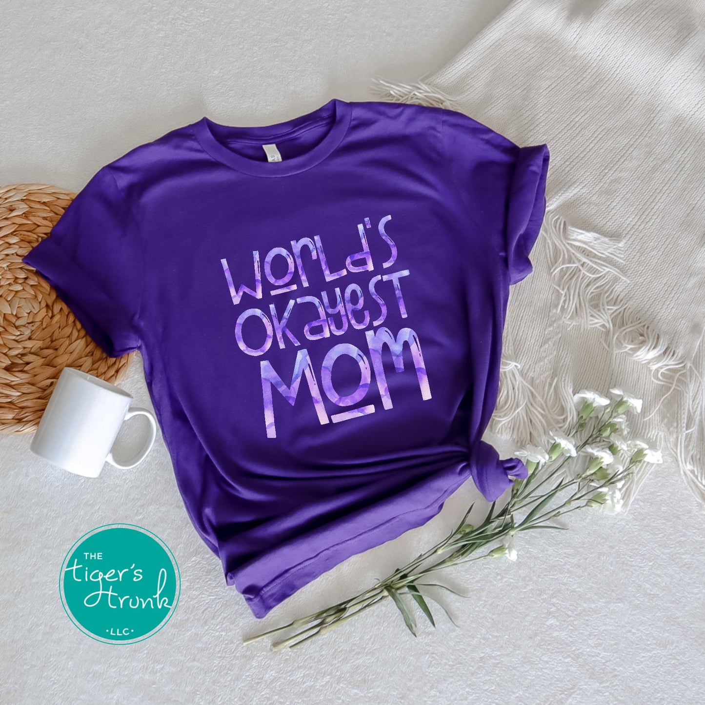 T-shirt with "World’s Okayest Mom" funny and casual design, perfect for Mother's Day, birthdays, or everyday mom life wear