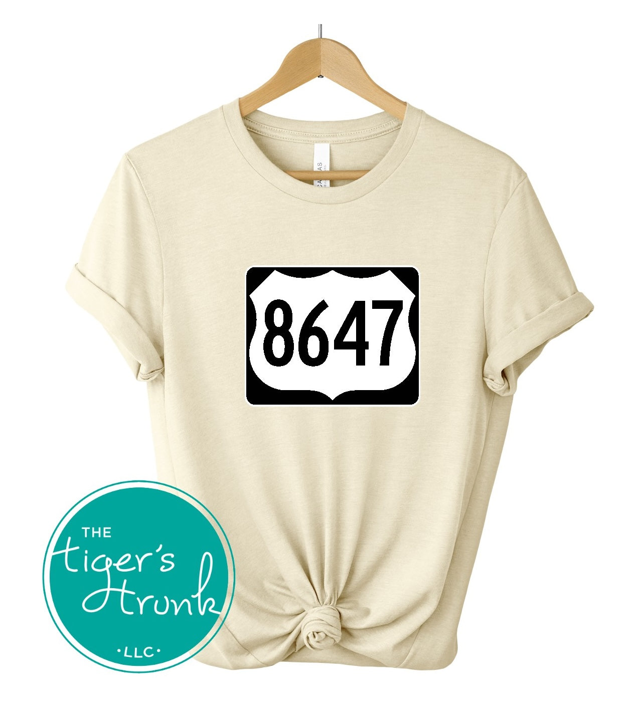 Graphic tee with 8647 inside a highway sign design, subtle political statement shirt for quiet resistance