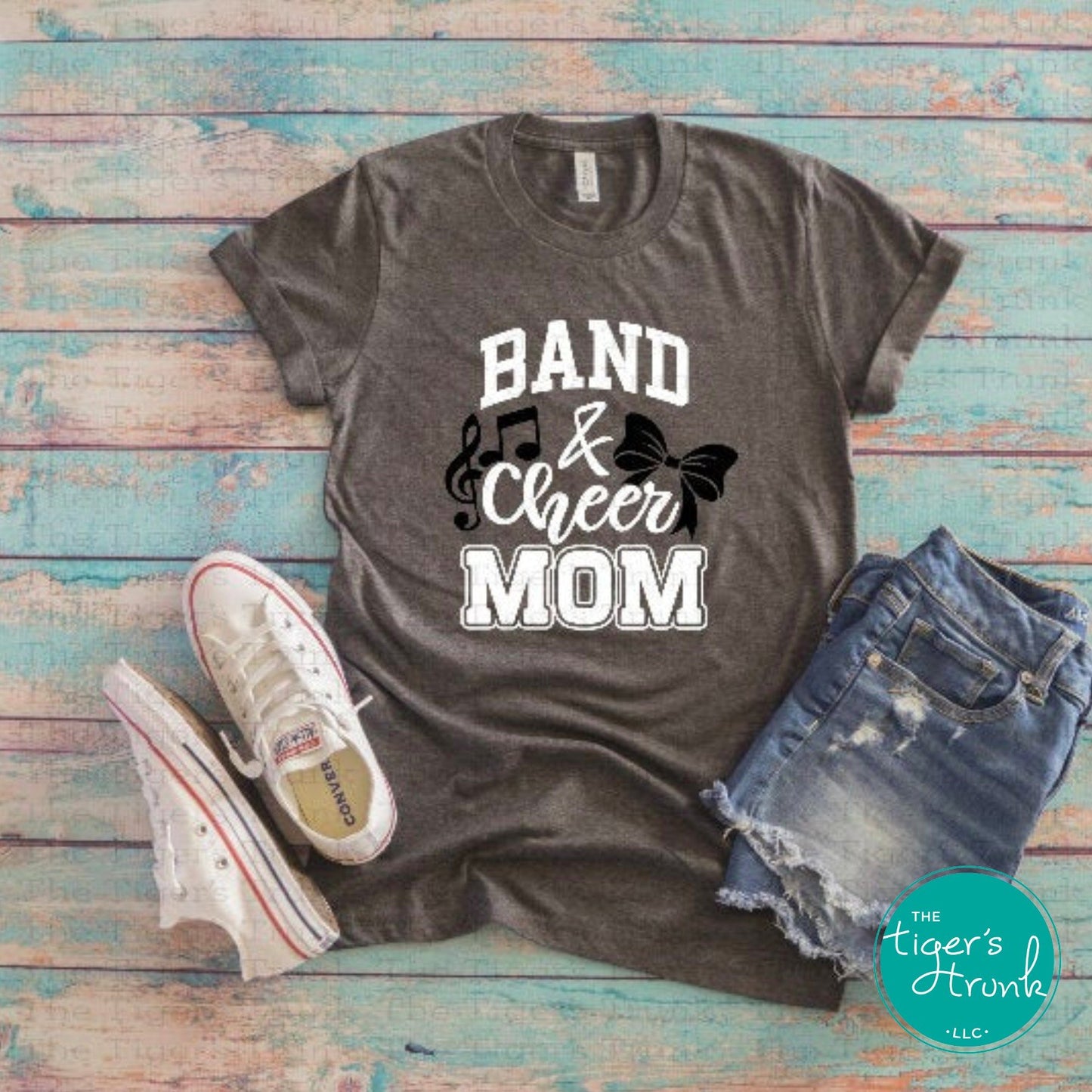 Custom Band and Cheer Mom shirt with bow and music note accents, personalized in school colors for spirited game day wear