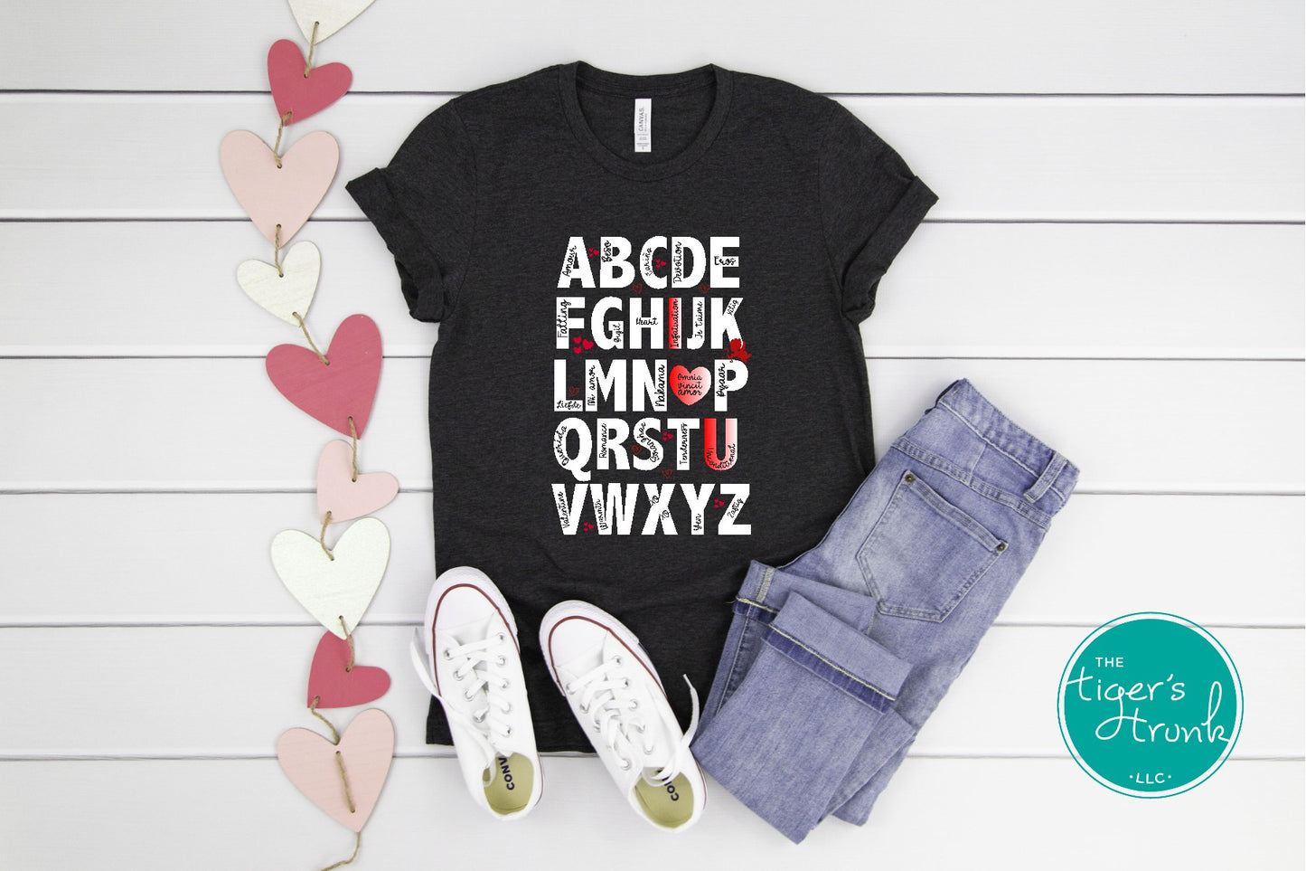 Adorable Valentine's alphabet shirt available in adult and kid sizes. Features a playful A to Z design with love-themed words. Ideal for Valentine's Day parties, matching outfits, and gifts.