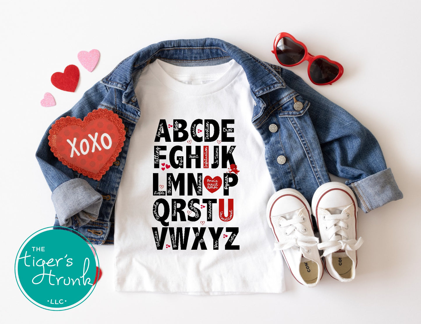 Adorable Valentine's alphabet shirt available in adult and kid sizes. Features a playful A to Z design with love-themed words. Ideal for Valentine's Day parties, matching outfits, and gifts.