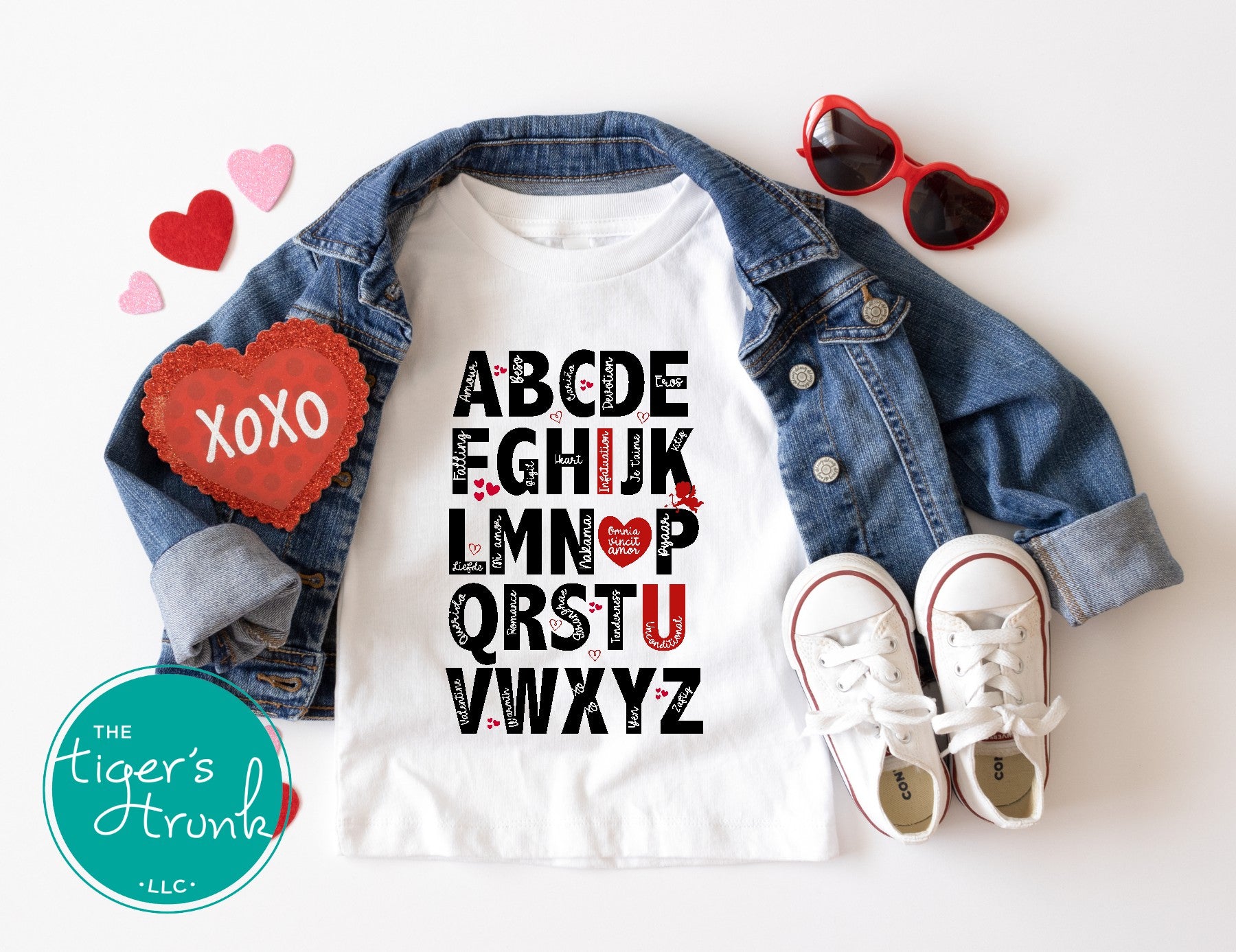 Adorable Valentine's alphabet shirt available in adult and kid sizes. Features a playful A to Z design with love-themed words. Ideal for Valentine's Day parties, matching outfits, and gifts.