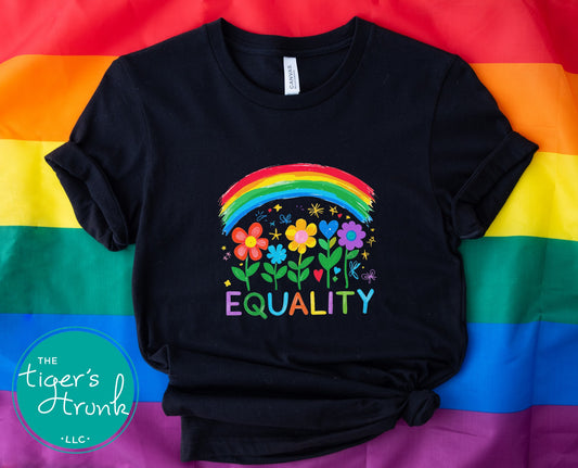 T-shirt with rainbow, flowers, and “Equality” text in rainbow colors, LGBTQ+ Pride shirt available in black or white for allies and community support