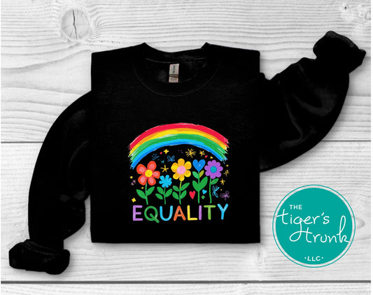 Unisex black sweatshirt with rainbow and colorful flowers spelling Equality – inclusive Pride clothing