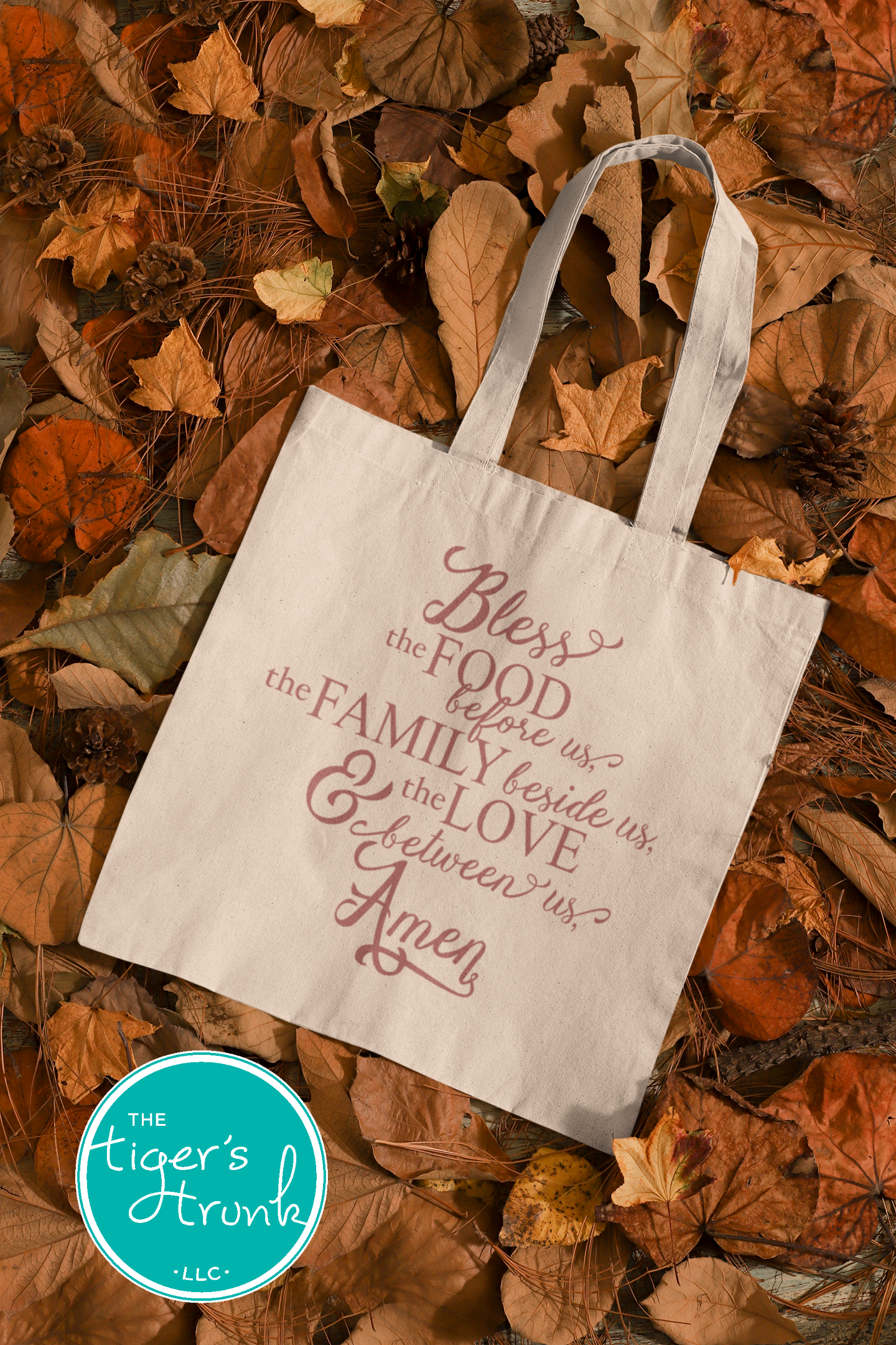 Tote bag with inspirational quote on autumn leaves, featuring The Tiger's Den logo.