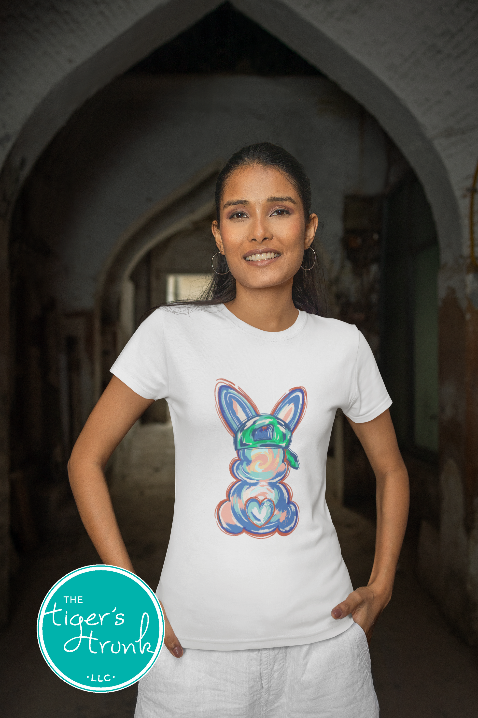 Easter t-shirt with a watercolor blue bunny wearing a ball cap, perfect for fun and casual spring celebrations