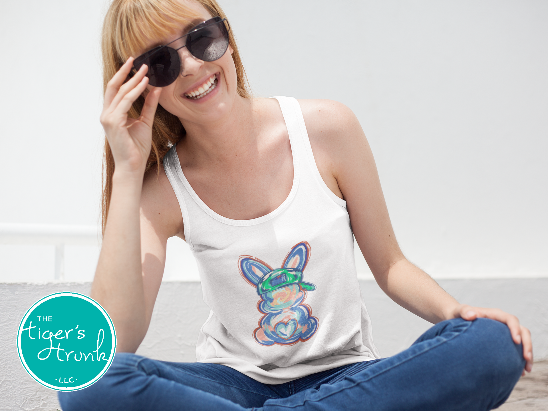 Easter t-shirt with a watercolor blue bunny wearing a ball cap, perfect for fun and casual spring celebrations
