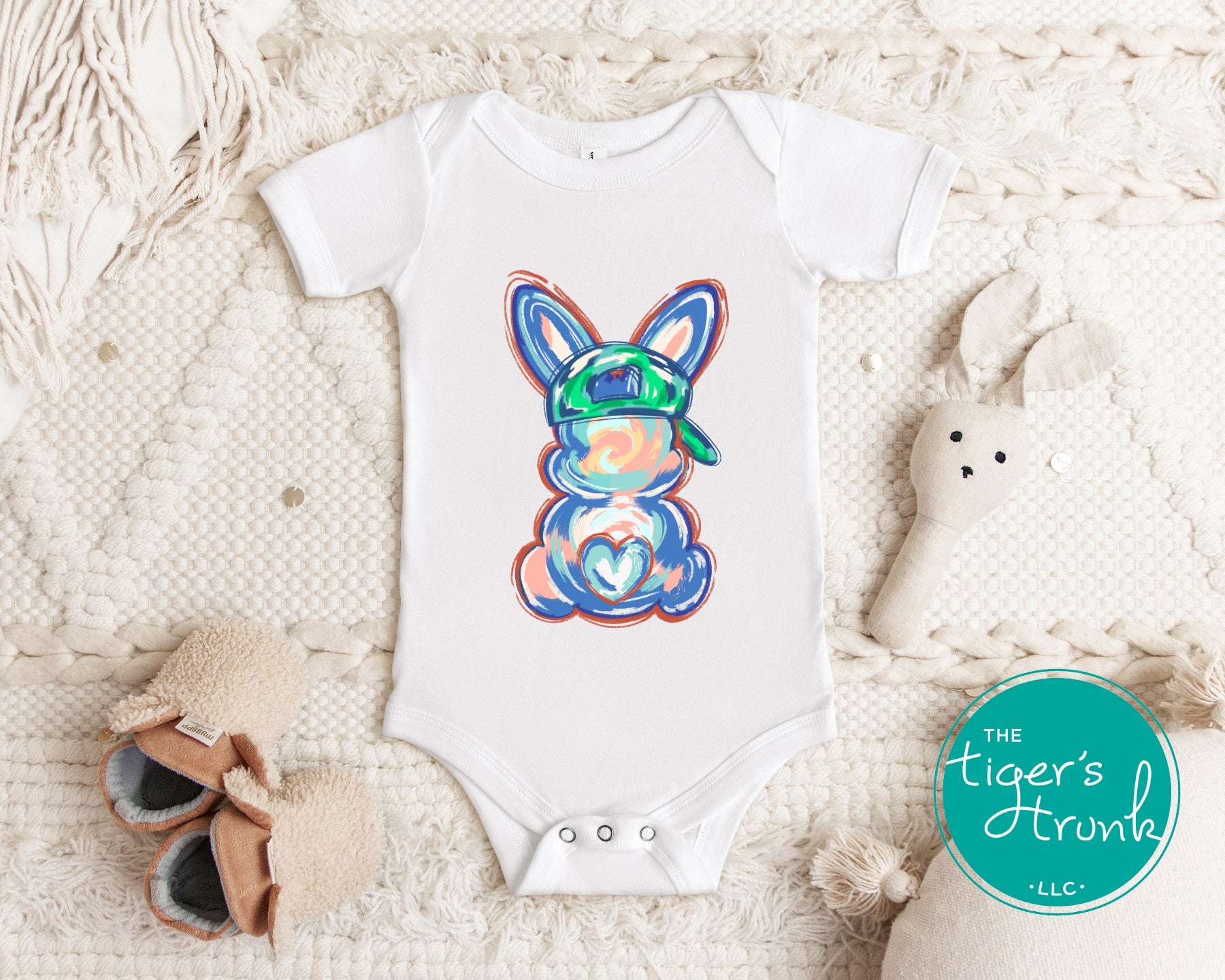 Easter t-shirt with a watercolor blue bunny wearing a ball cap, perfect for fun and casual spring celebrations