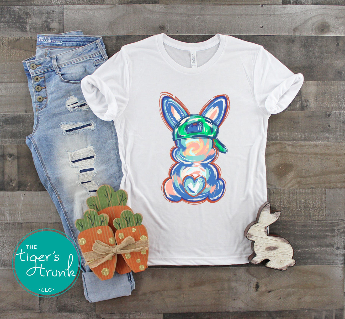Easter t-shirt with a watercolor blue bunny wearing a ball cap, perfect for fun and casual spring celebrations