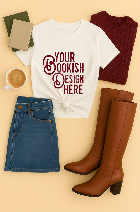 White t-shirt with 'Your Bookish Design Here' text, blue skirt, brown boots, and coffee cup on a beige background