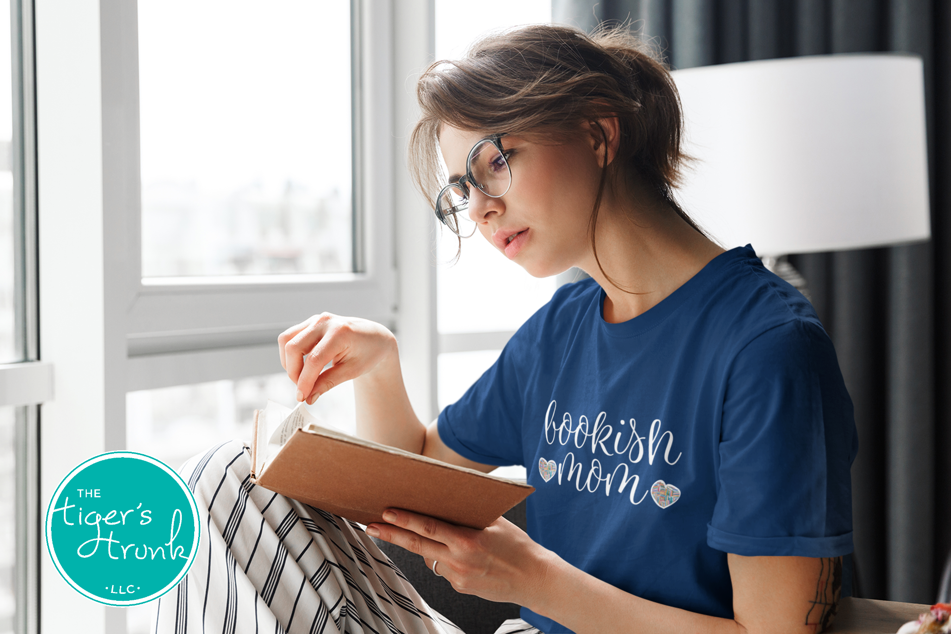 T-shirt that says "Bookish Mom," soft and simple design perfect for moms who love to read