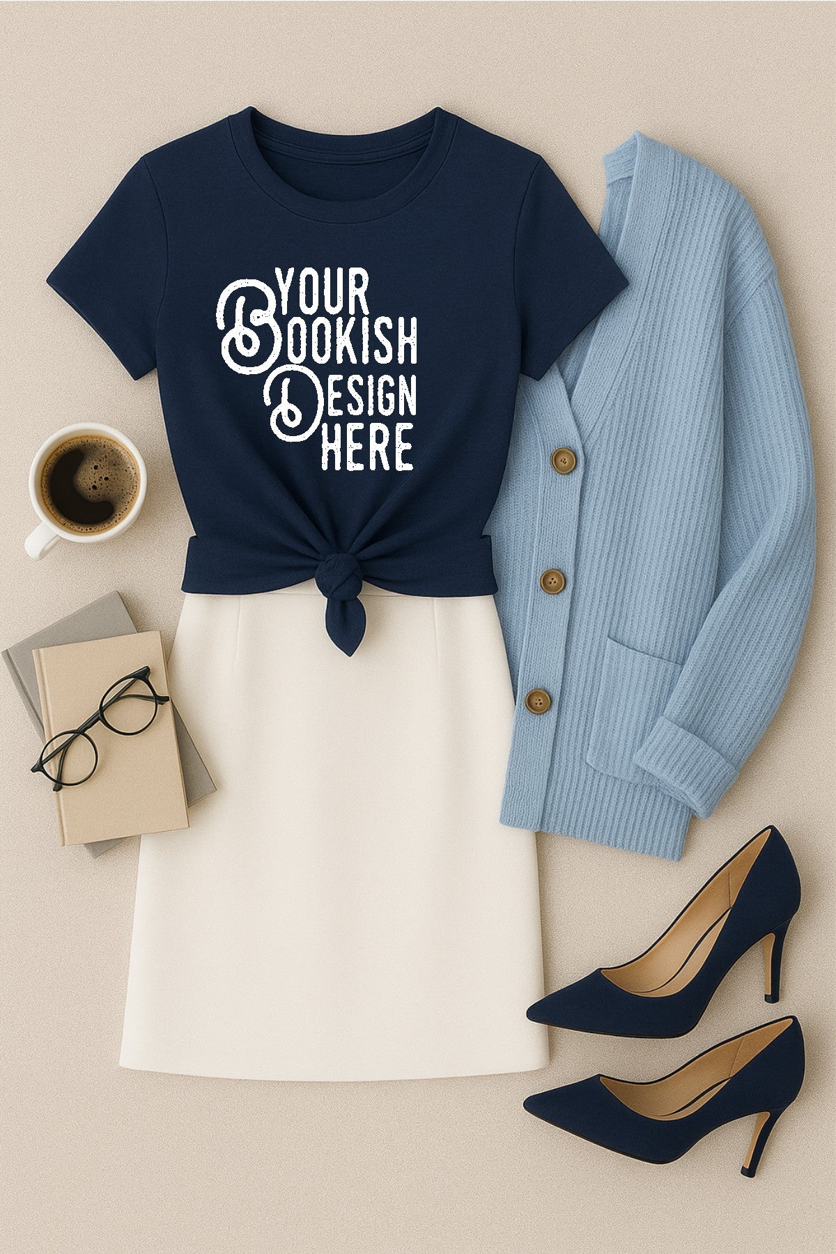 Navy t-shirt with 'Your Bookish Design Here' text, white skirt, blue cardigan, high heels, glasses, and coffee on a beige background.