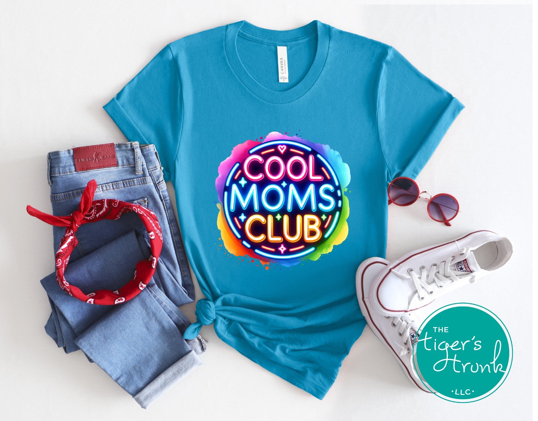 Graphic t-shirt with Cool Mom's Club text in neon colors, fun and trendy design for stylish moms
