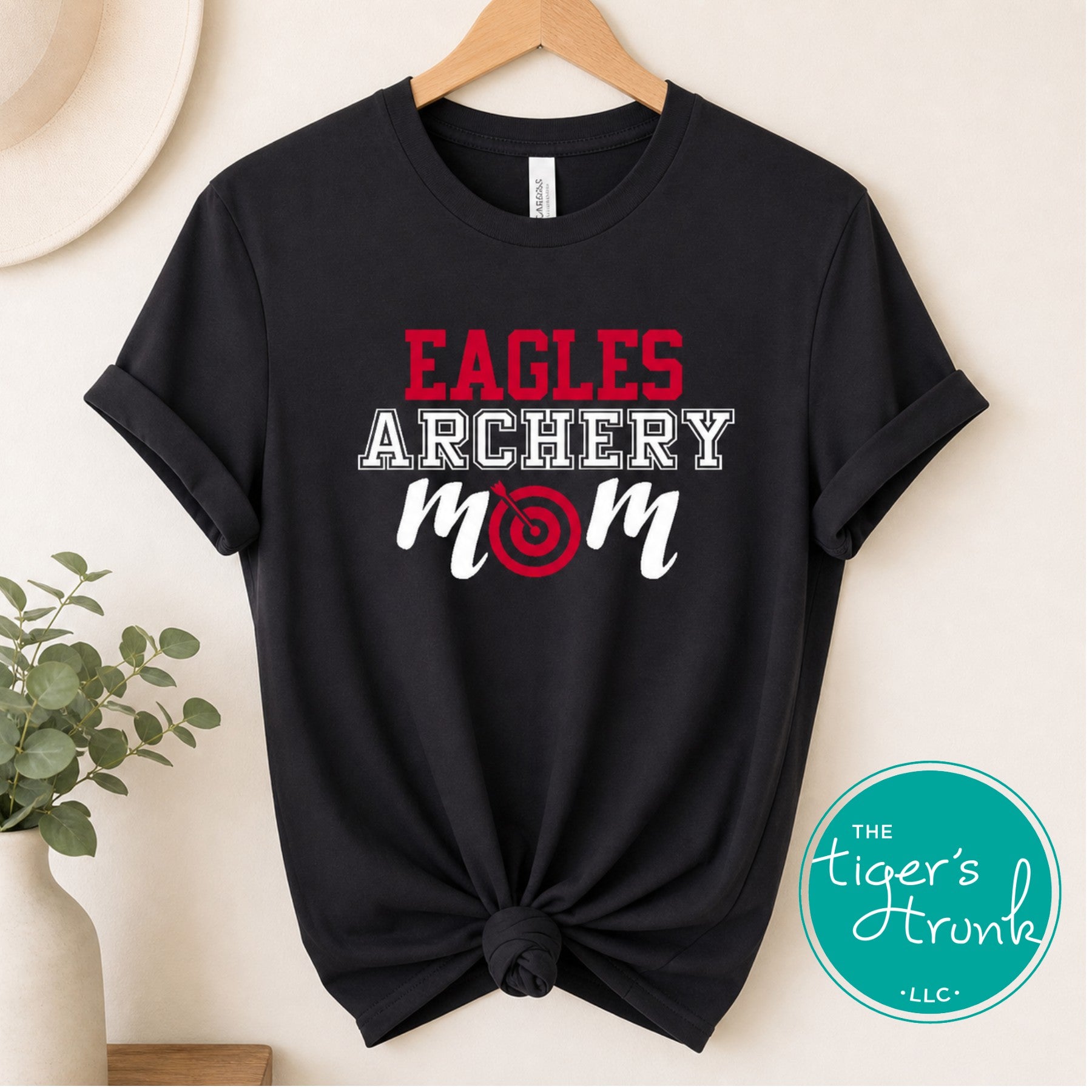 black archery mom shirt with personalized team name and custom colors displayed on knotted t-shirt