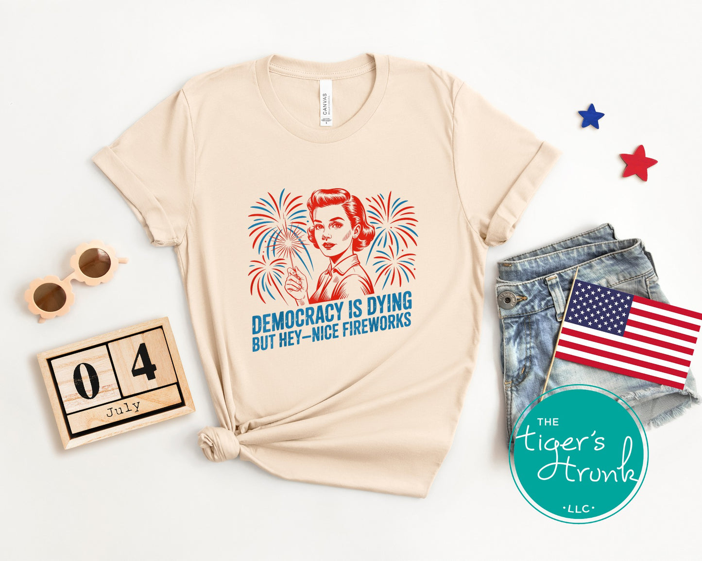 Darkly funny t-shirt that reads Democracy Is Dying But Hey, Nice Fireworks, perfect for sarcastic Independence Day wear
