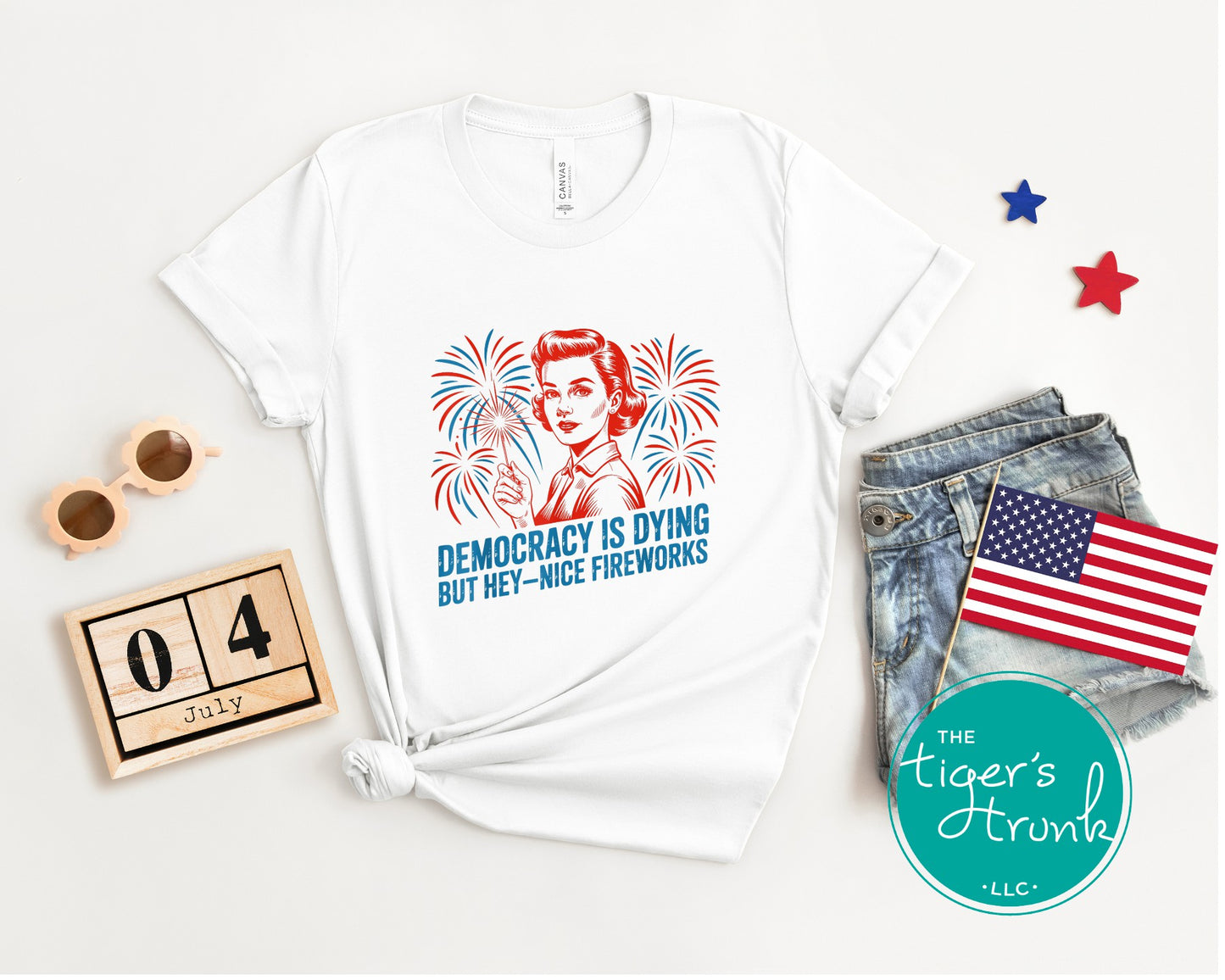 Darkly funny t-shirt that reads Democracy Is Dying But Hey, Nice Fireworks, perfect for sarcastic Independence Day wear