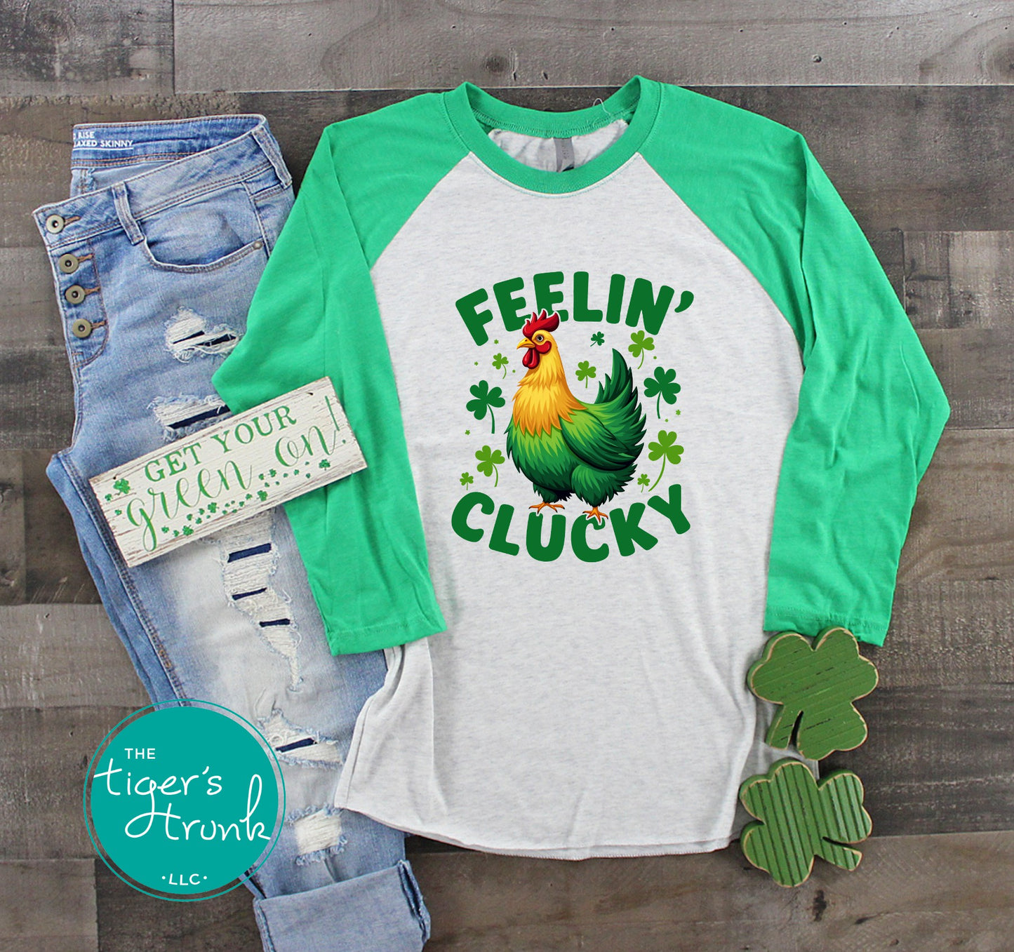 Funny St. Patrick’s Day tank top featuring Feelin’ Clucky text with a rooster graphic, festive Irish humor apparel