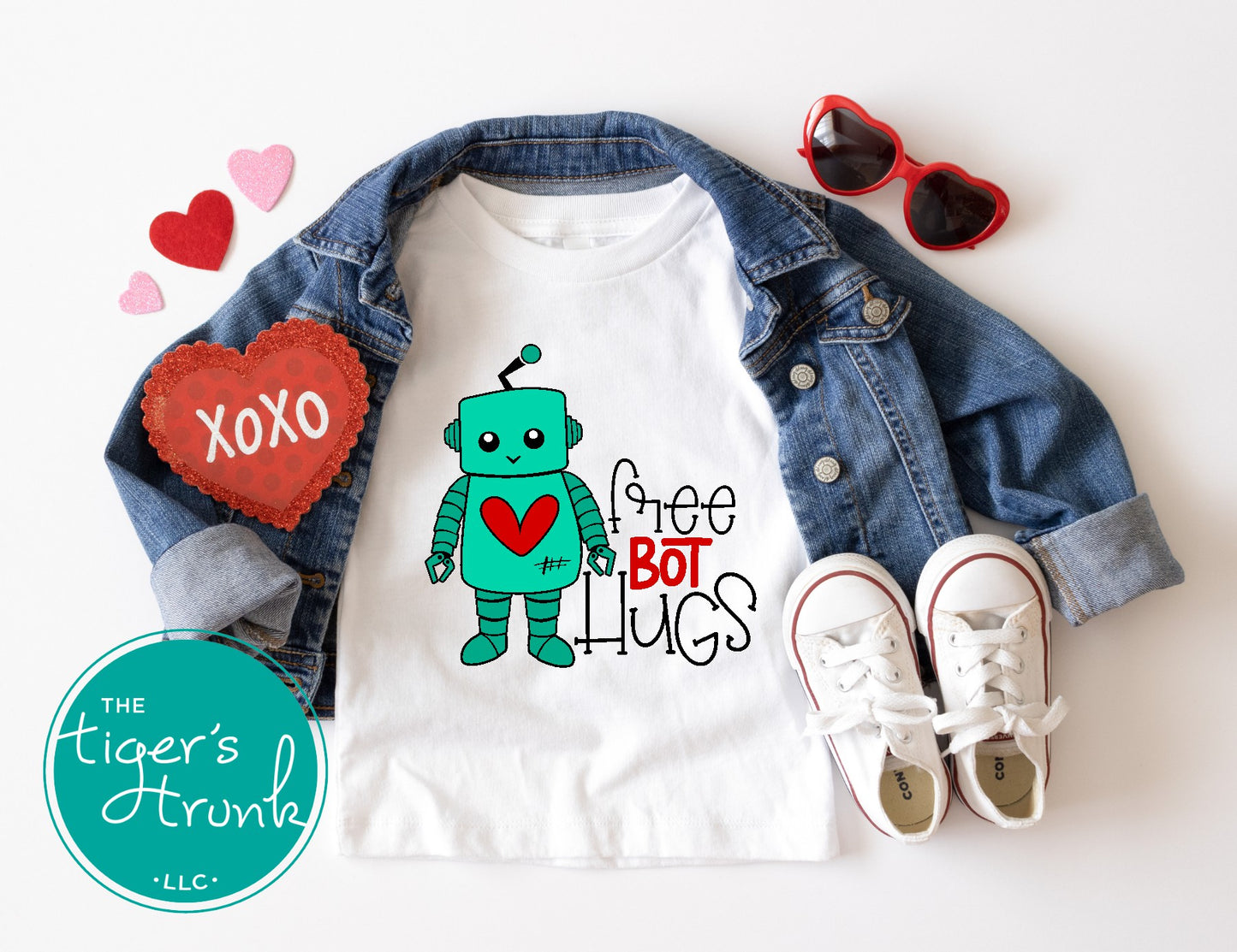 Kids Valentine’s Day shirt with the phrase Free Bot Hugs, a fun STEM-inspired robot design for young tech enthusiasts."