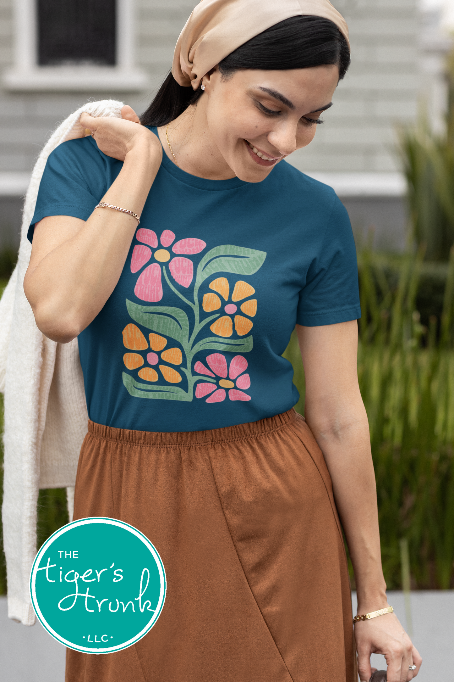 Bright floral-patterned t-shirt with hidden Fuck Trump message, subtle activism apparel