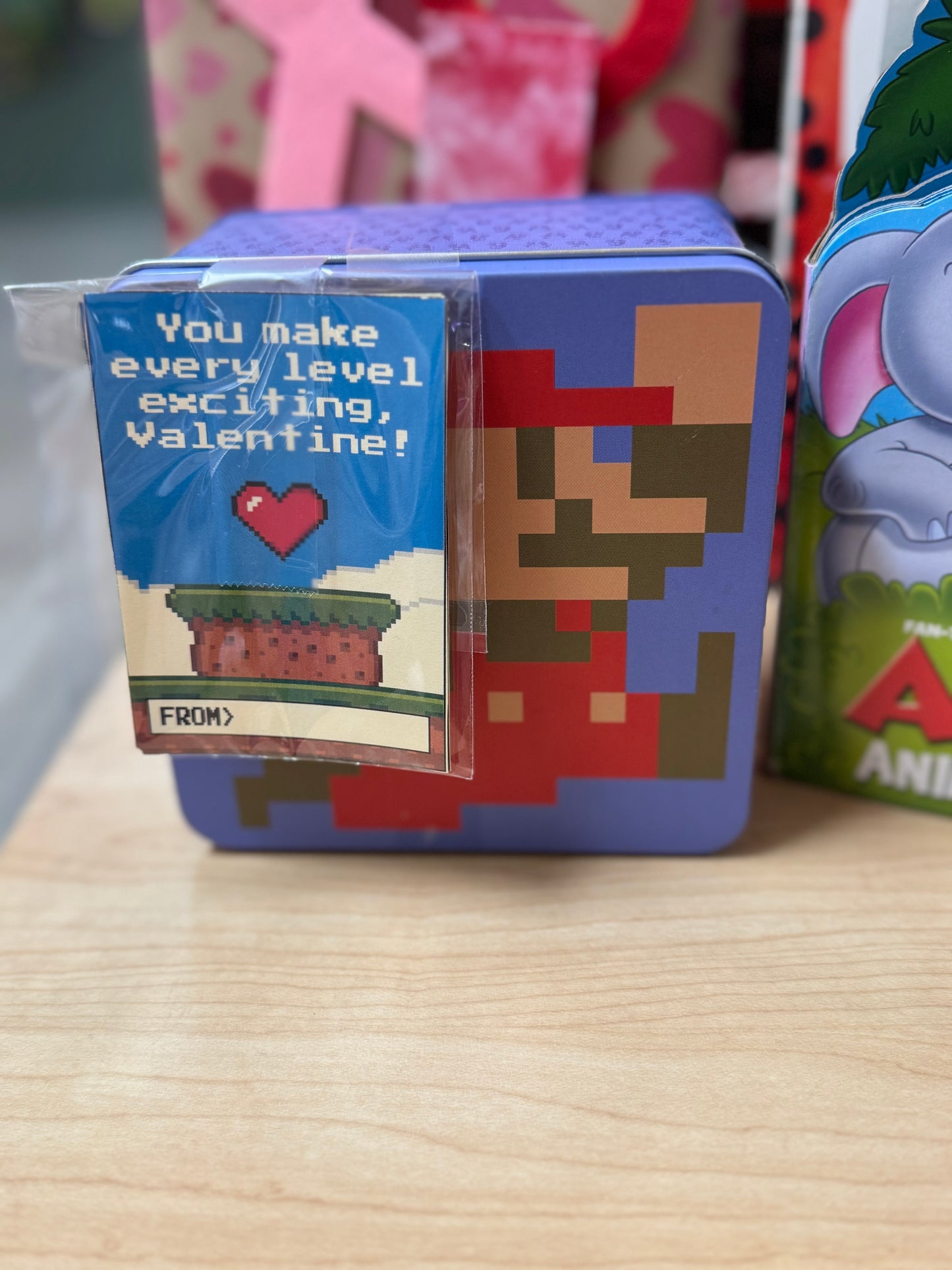 Valentine’s cards with a video game theme featuring messages like "You Make Every Level Exciting" and "Valentine You’re My Player 2."