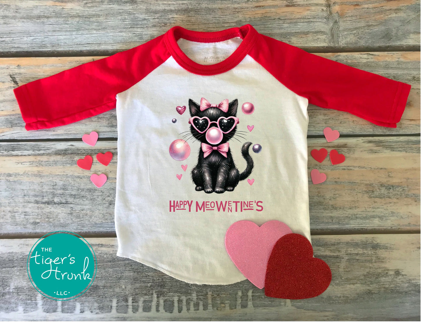 Valentine’s shirt with a cat blowing a bubble and the phrase "Happy Meowentine’s," perfect for kids and adults.