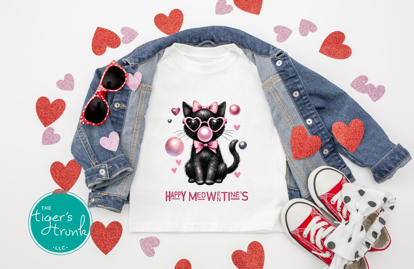 Valentine’s shirt with a cat blowing a bubble and the phrase "Happy Meowentine’s," perfect for kids and adults.