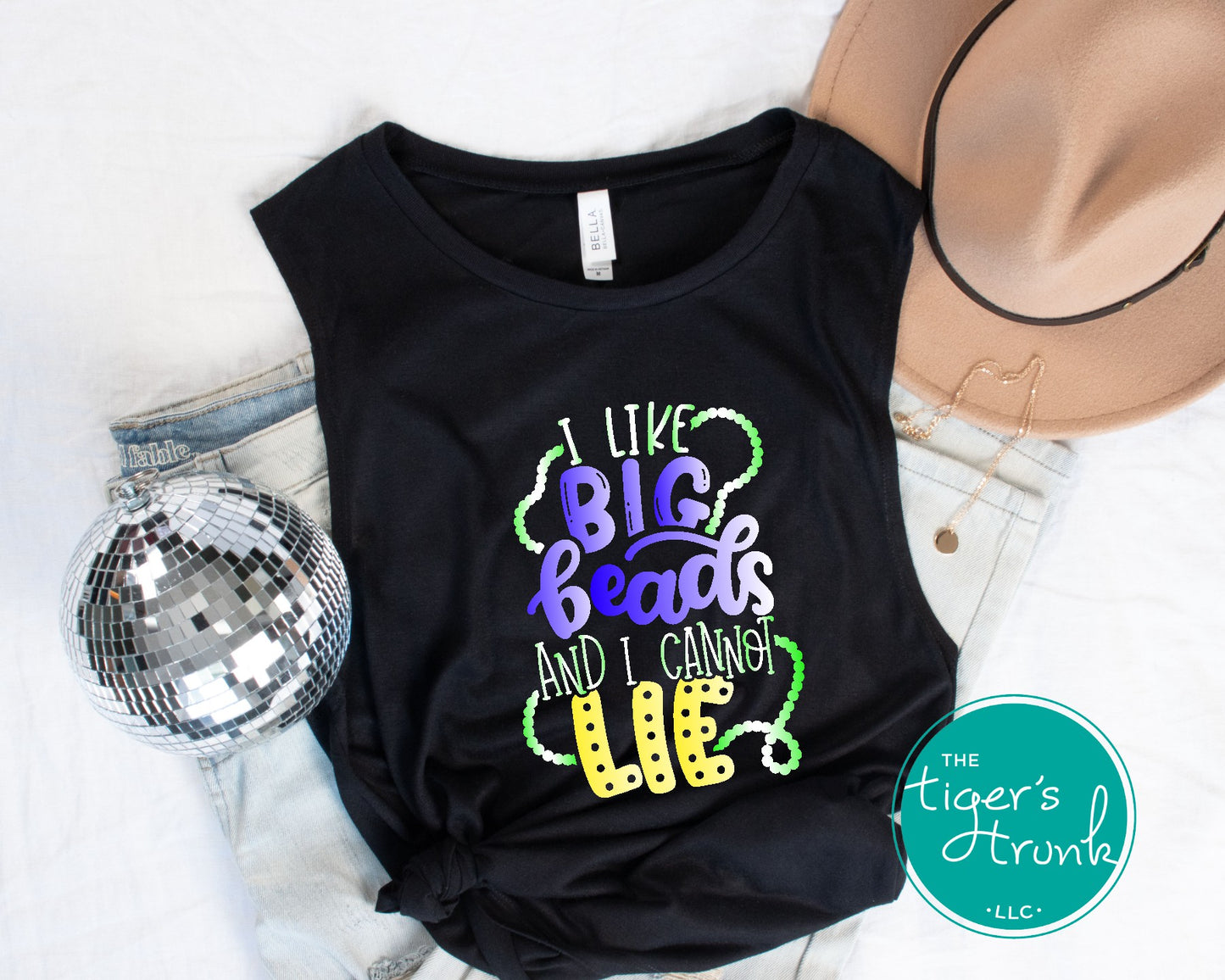 Funny Mardi Gras shirt reading "I Like Big Beads and I Cannot Lie" with a watercolor ombre design in purple, green, and gold.