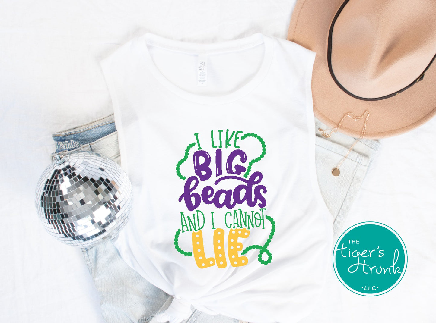 Funny Mardi Gras shirt reading "I Like Big Beads and I Cannot Lie" with a watercolor ombre design in purple, green, and gold.