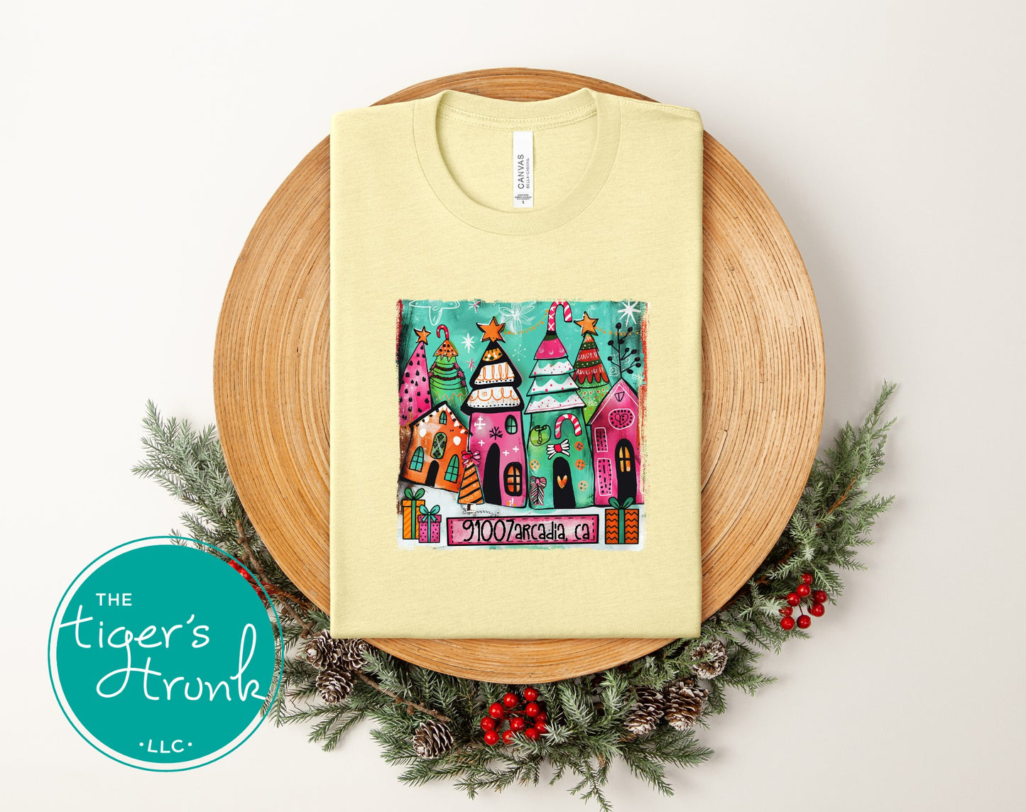 French vanilla Christmas shirt featuring cheerful illustrated holiday houses and trees with ZIP code 91007 Arcadia, CA.