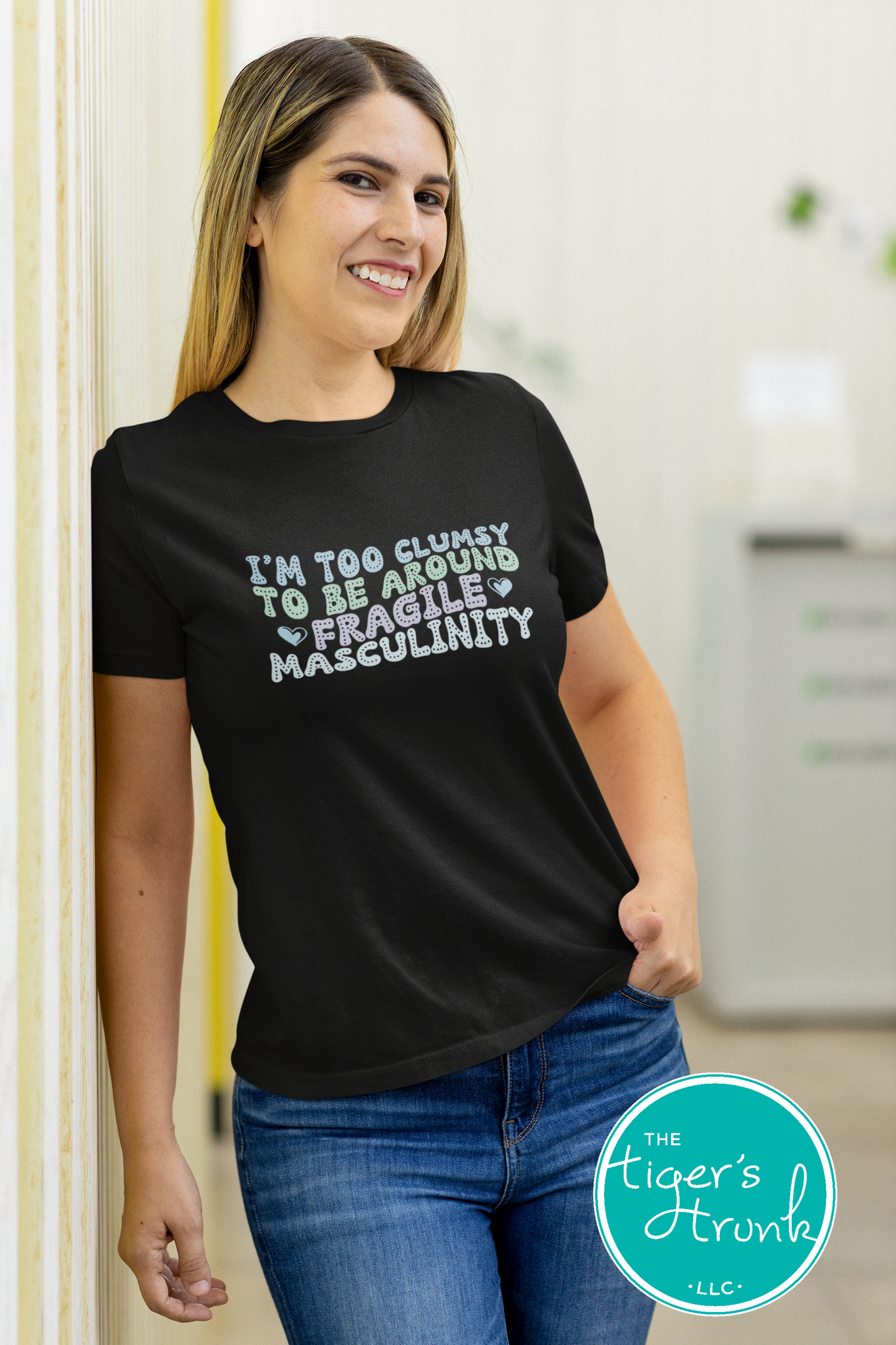 Funny feminist t-shirt with I’m Too Clumsy to Be Around Fragile Masculinity message, bold social commentary apparel