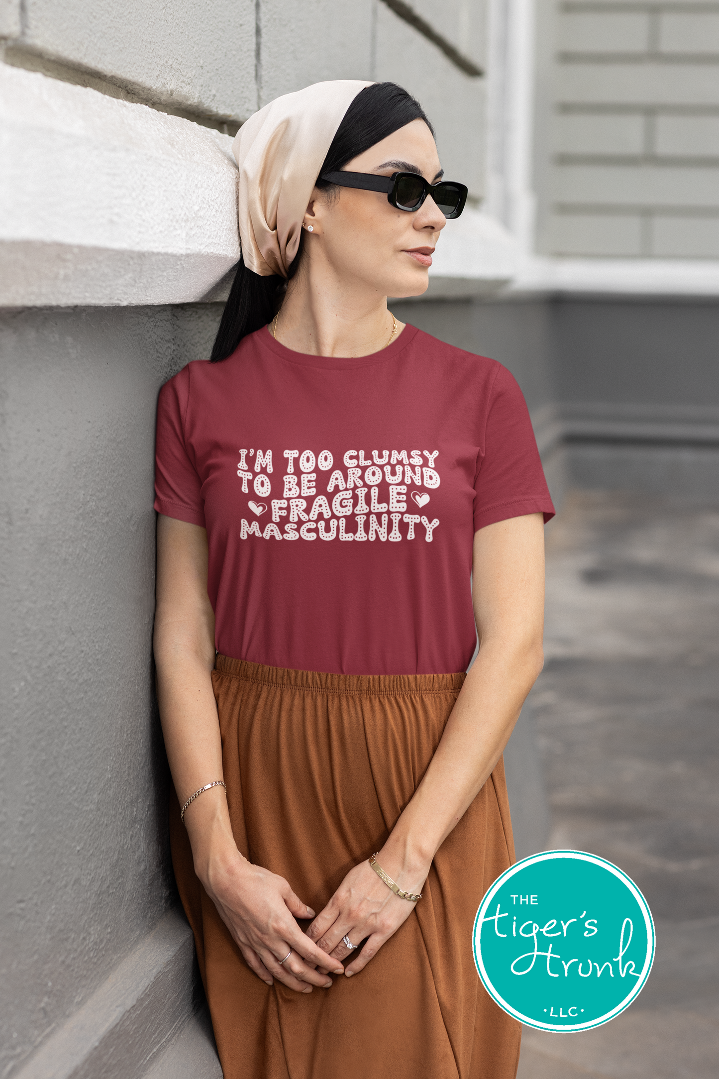 Funny feminist t-shirt with I’m Too Clumsy to Be Around Fragile Masculinity message, bold social commentary apparel