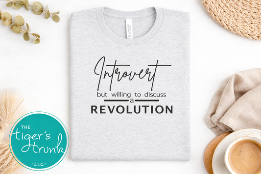Ash gray introvert revolution graphic t-shirt flat lay