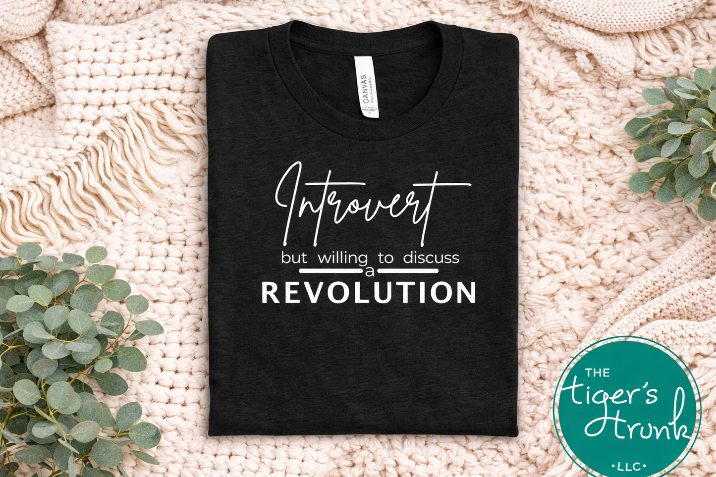 Black introvert revolution shirt with white text