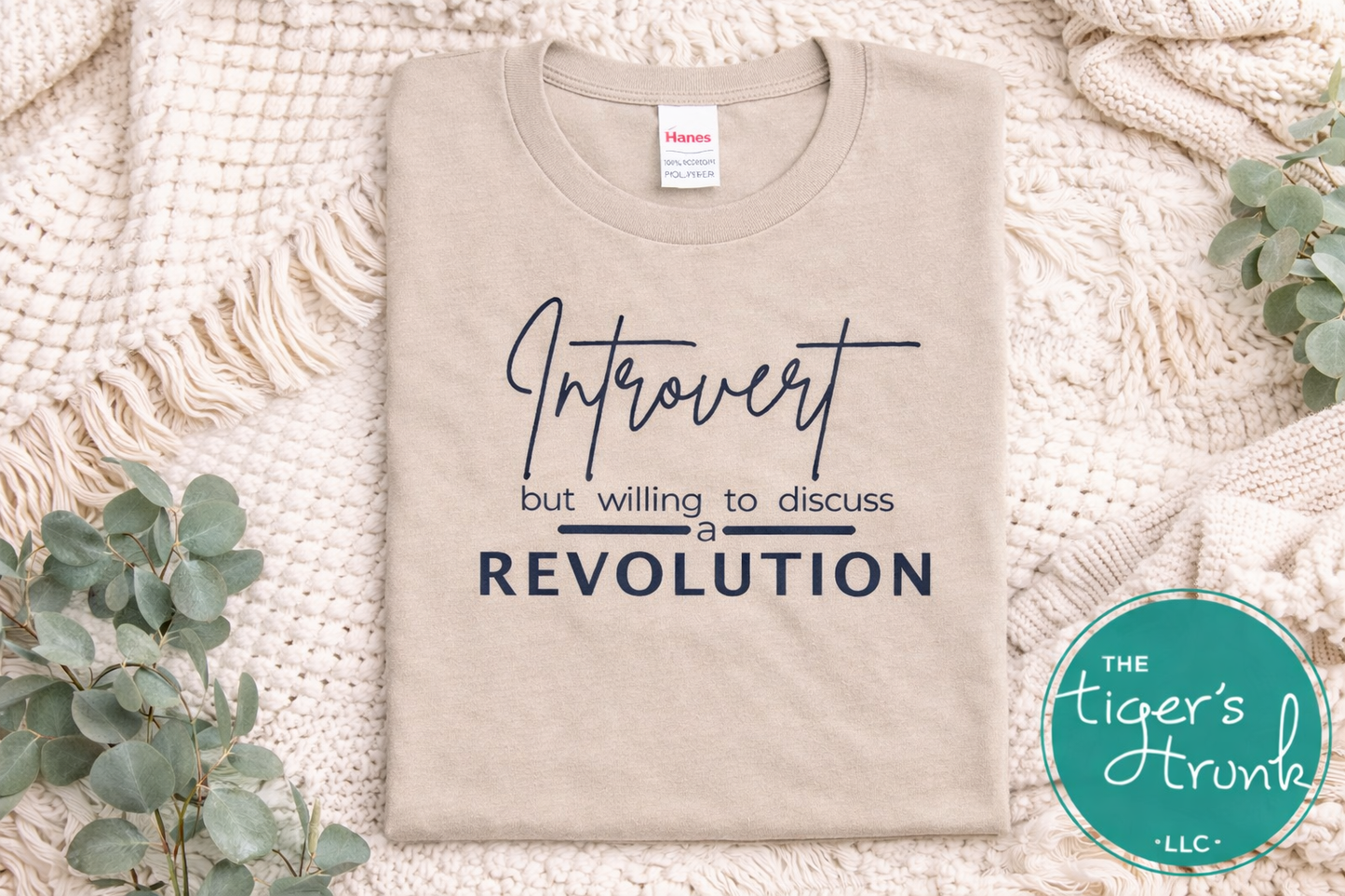 Sand color introvert revolution shirt flat lay