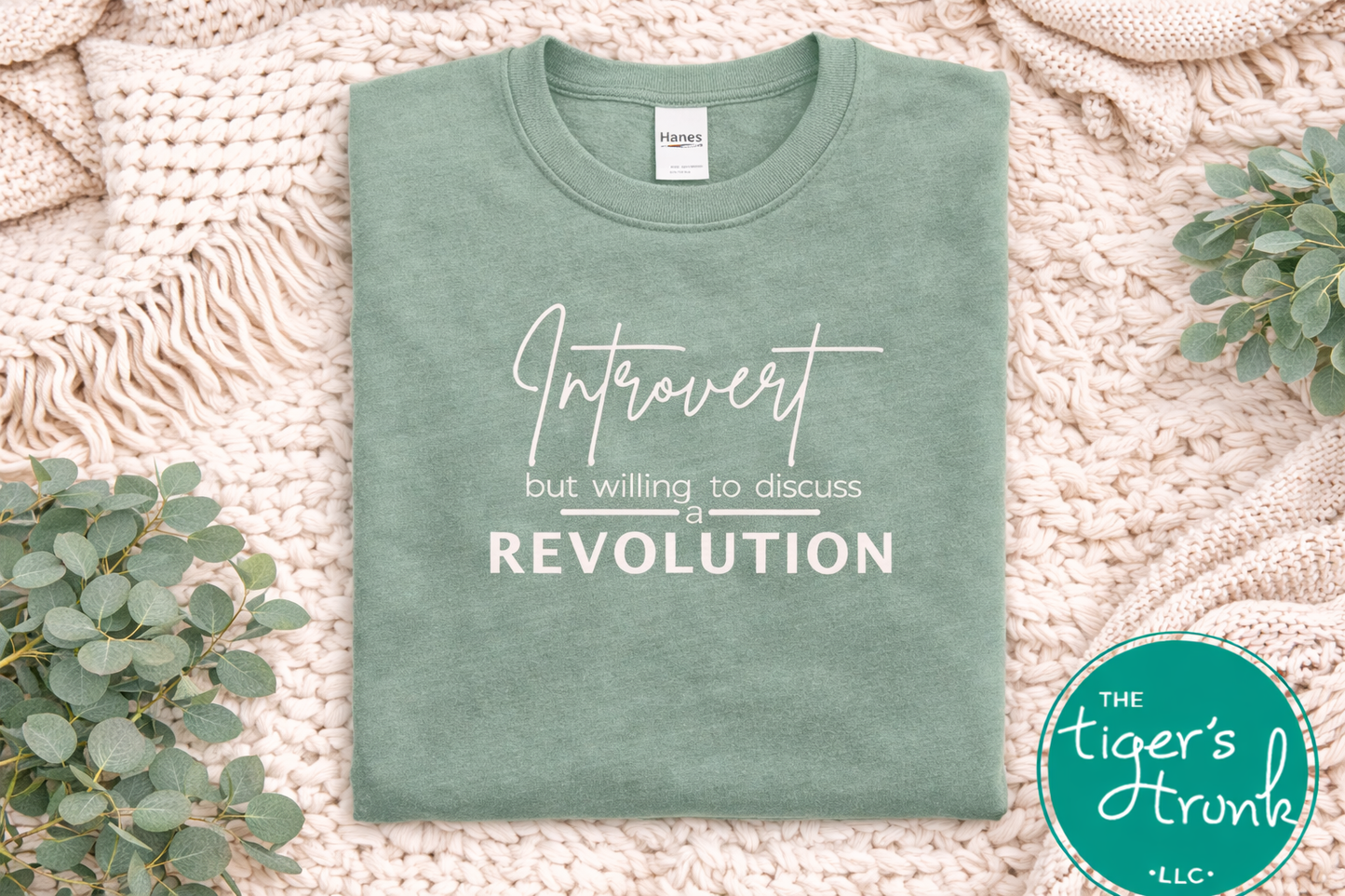 Stonewashed green introvert shirt with white text