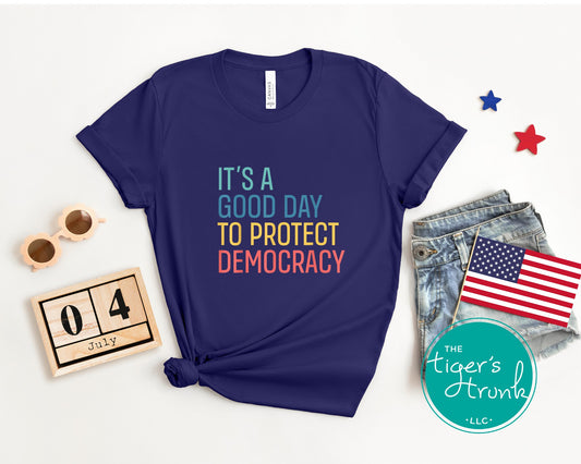 T-shirt with bold Protect Democracy message, patriotic civic engagement graphic for voters and political activists