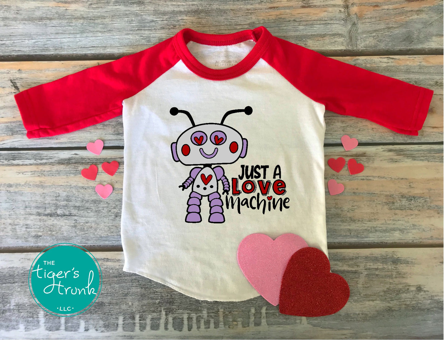 Kids Valentine’s Day t-shirt with the phrase Just a Love Machine, a playful robot-themed STEM design for young enthusiasts.