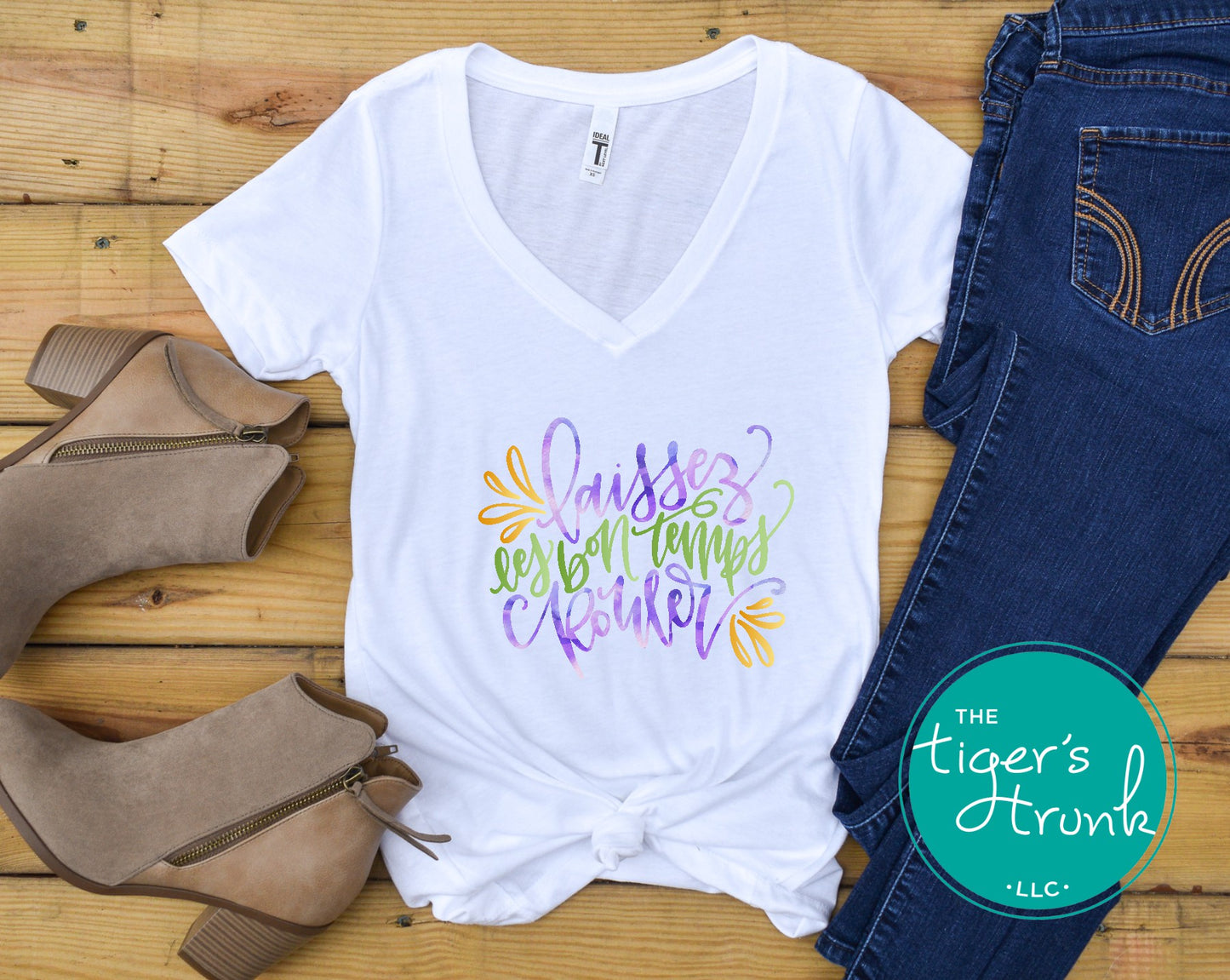 Mardi Gras v-neck shirt featuring the phrase Laissez les Bon Temps Rouler, perfect for parades and parties.