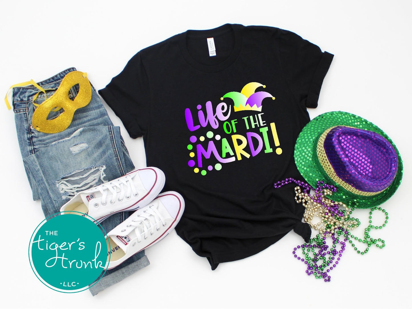 Life of the Mardi shirt with a watercolor design in purple, green, and gold, available as a t-shirt or muscle tank, perfect for Mardi Gras celebrations.