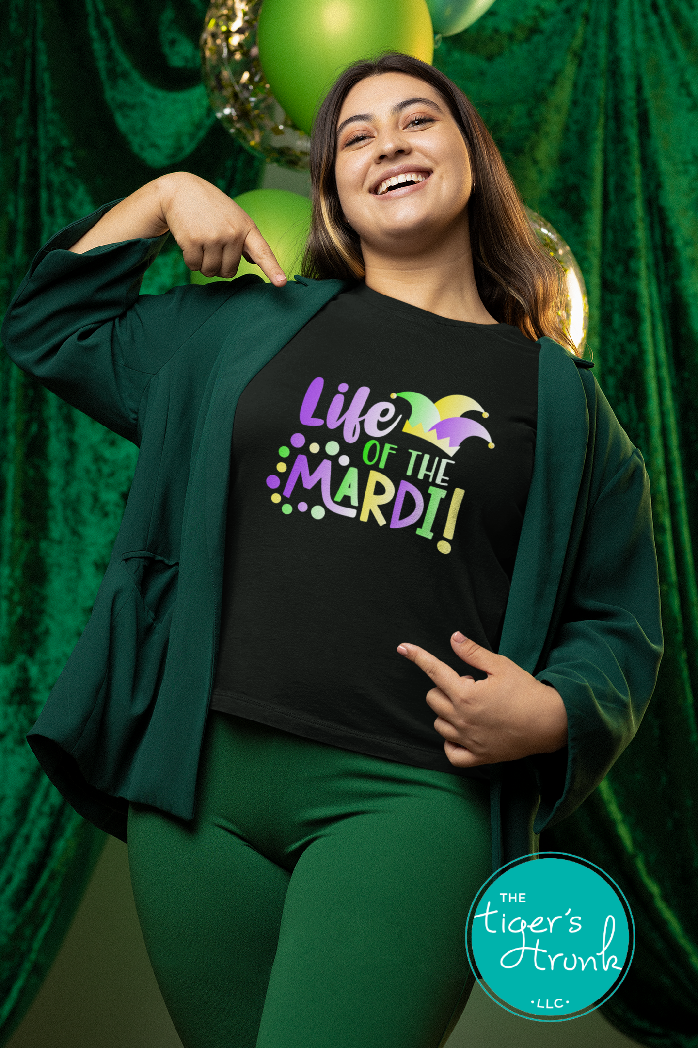 Life of the Mardi shirt with a watercolor design in purple, green, and gold, available as a t-shirt or muscle tank, perfect for Mardi Gras celebrations.