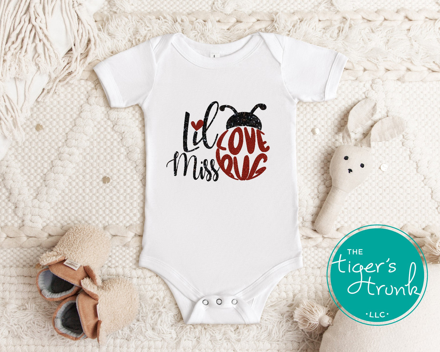 Cute Valentine’s Day t-shirt with the phrase Lil Miss Lovebug, perfect for kids to celebrate the holiday in style.