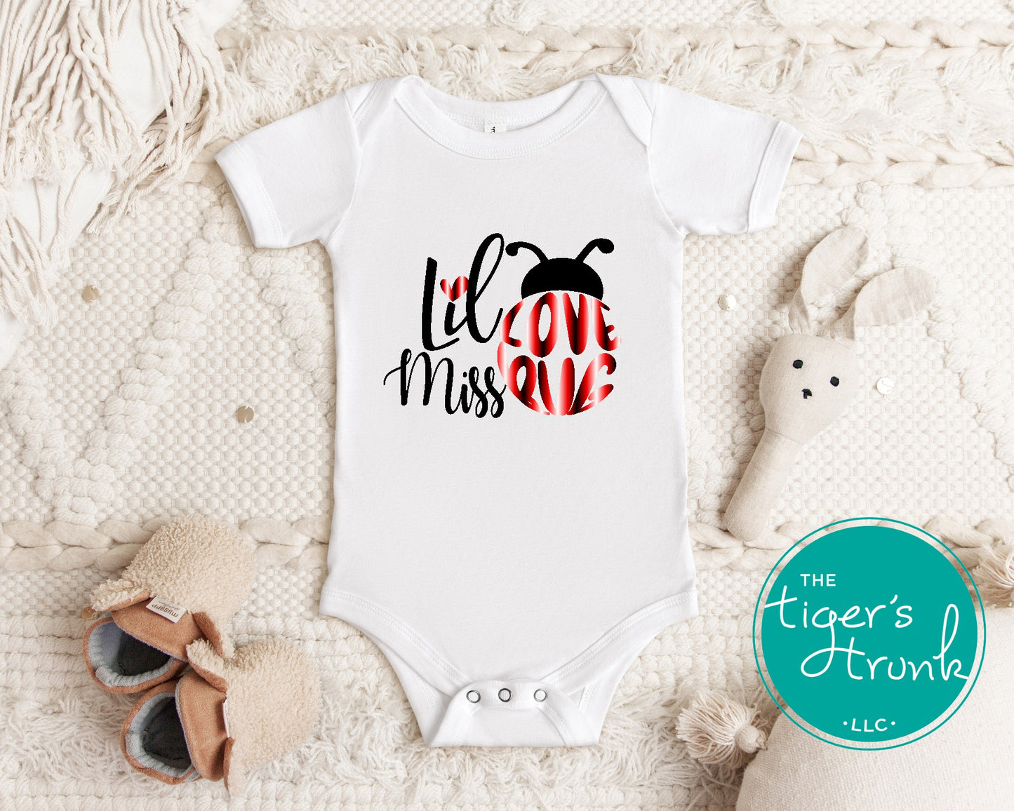 Cute Valentine’s Day t-shirt with the phrase Lil Miss Lovebug, perfect for kids to celebrate the holiday in style.