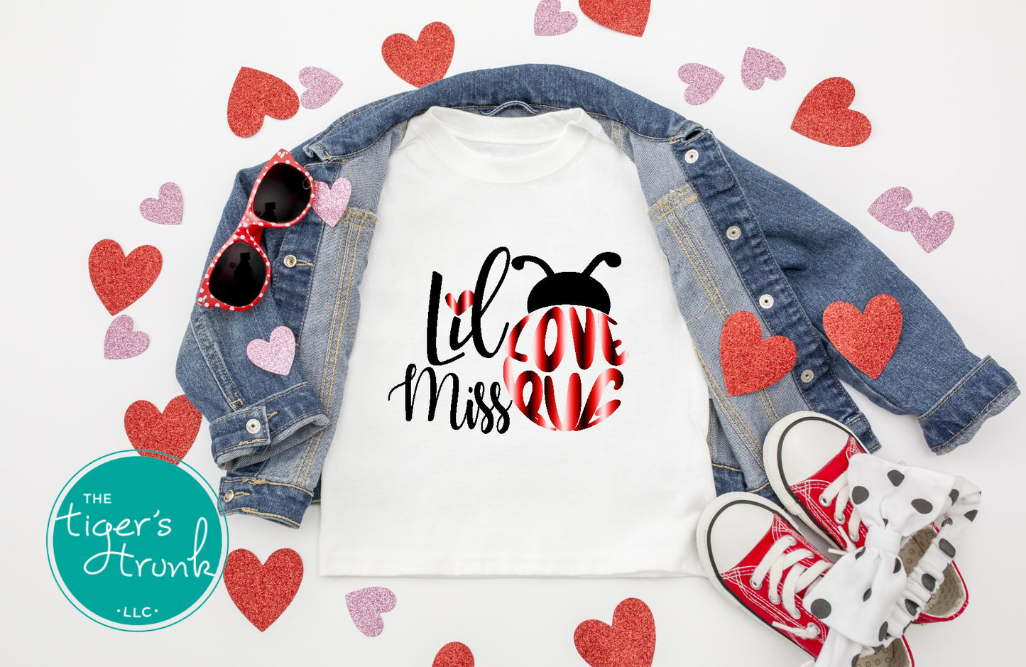 Cute Valentine’s Day t-shirt with the phrase Lil Miss Lovebug, perfect for kids to celebrate the holiday in style.