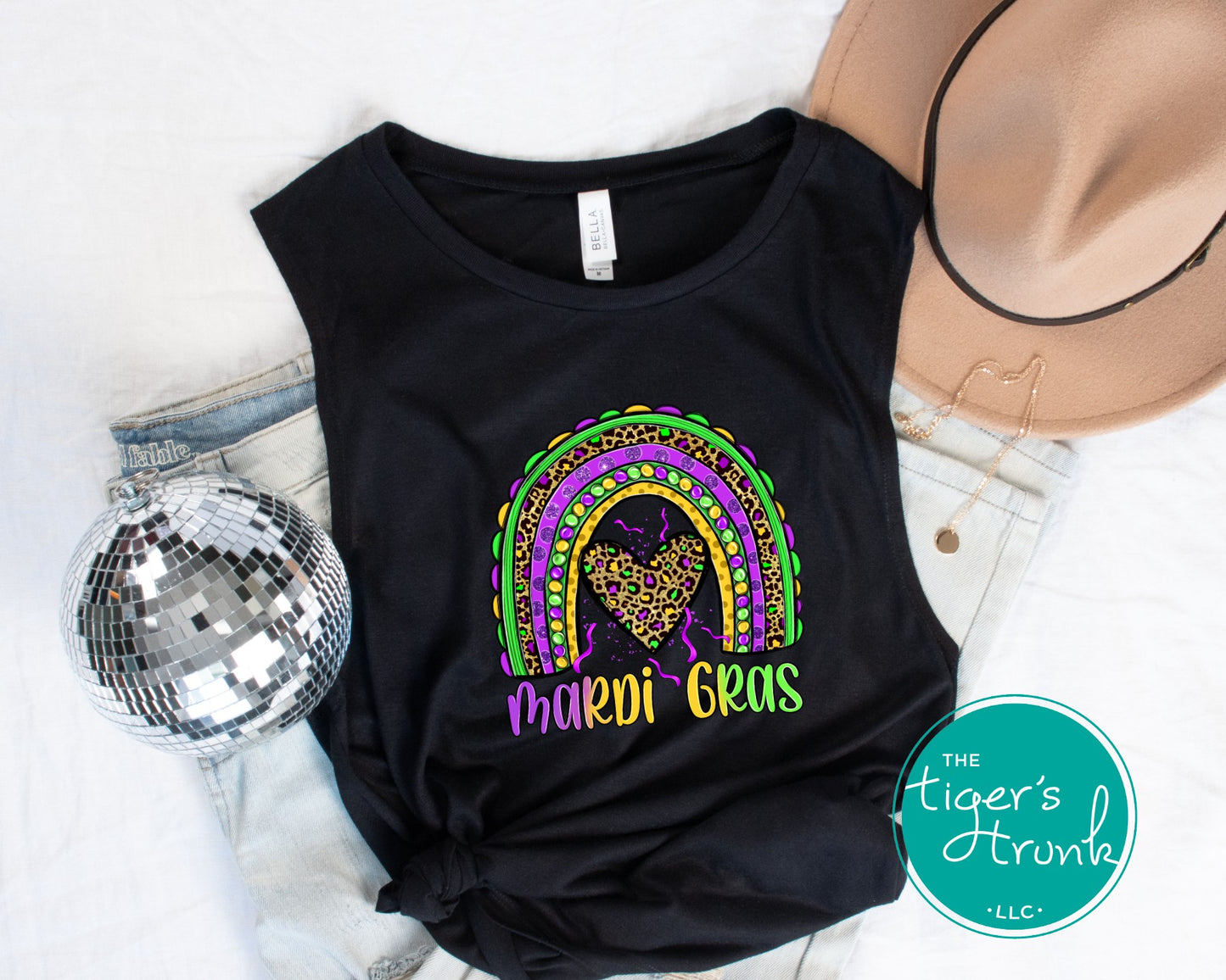 Muscle tank top with "Mardi Gras" and a rainbow design in purple, green, and gold, perfect for Mardi Gras celebrations.