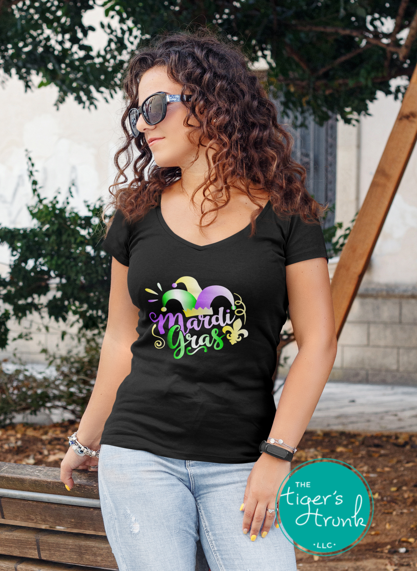 Festive Mardi Gras shirts with watercolor text in purple, green, and gold. Available as V-neck and muscle tank styles for parades or parties.