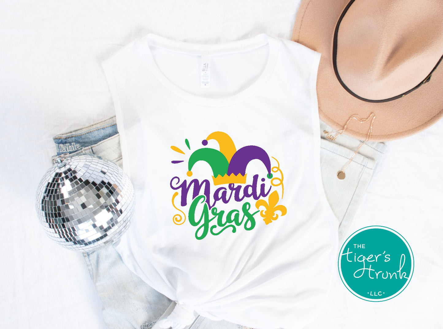 Festive Mardi Gras shirts with watercolor text in purple, green, and gold. Available as V-neck and muscle tank styles for parades or parties.