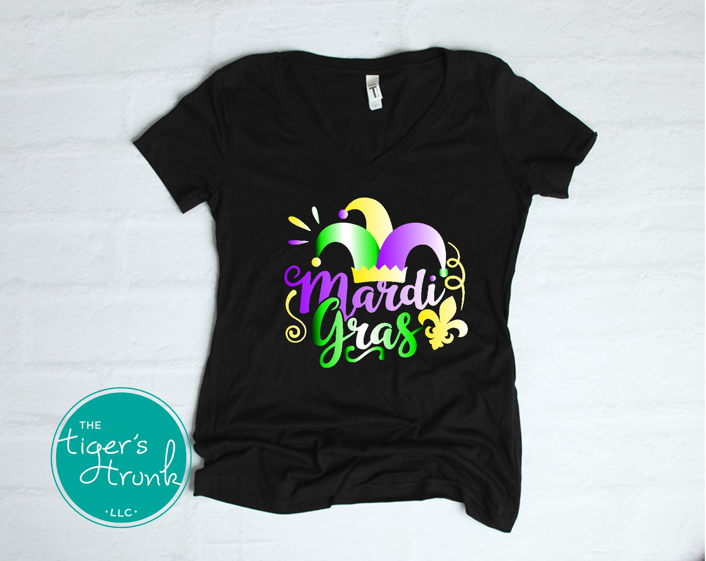 Festive Mardi Gras shirts with watercolor text in purple, green, and gold. Available as V-neck and muscle tank styles for parades or parties.