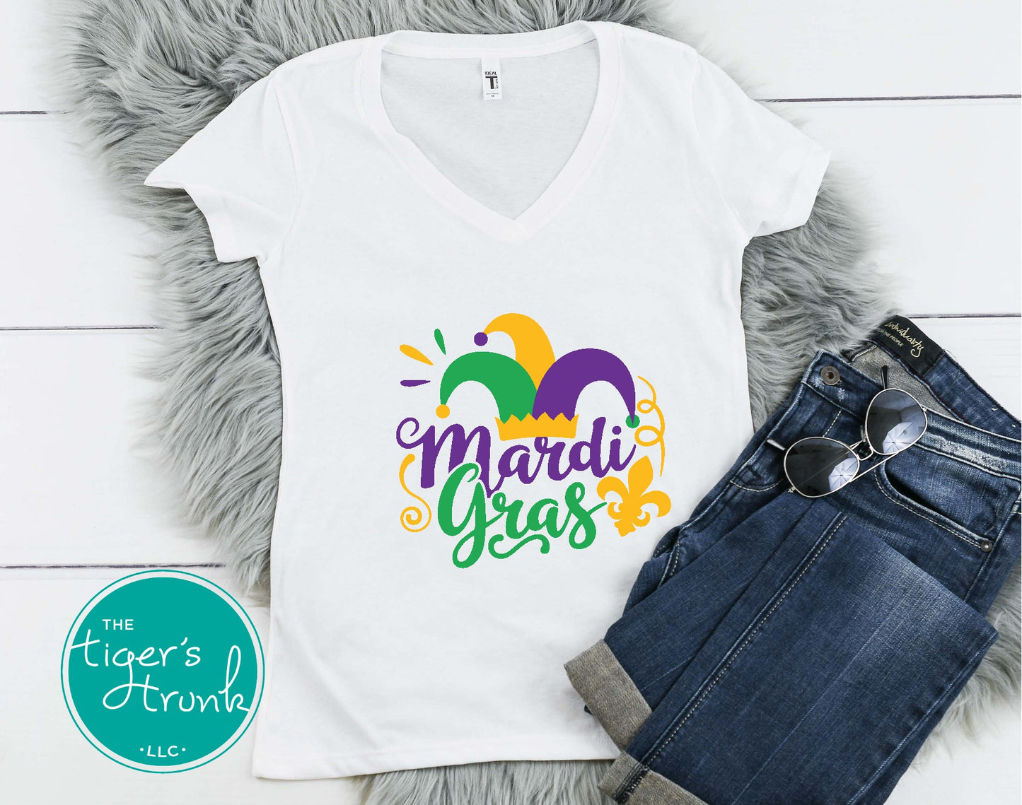 Festive Mardi Gras shirts with watercolor text in purple, green, and gold. Available as V-neck and muscle tank styles for parades or parties.