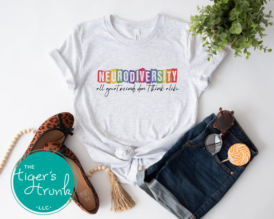 T-shirt with the phrase "Neurodiversity. All Great Minds Don’t Think Alike," empowering graphic design for autism and ADHD awareness